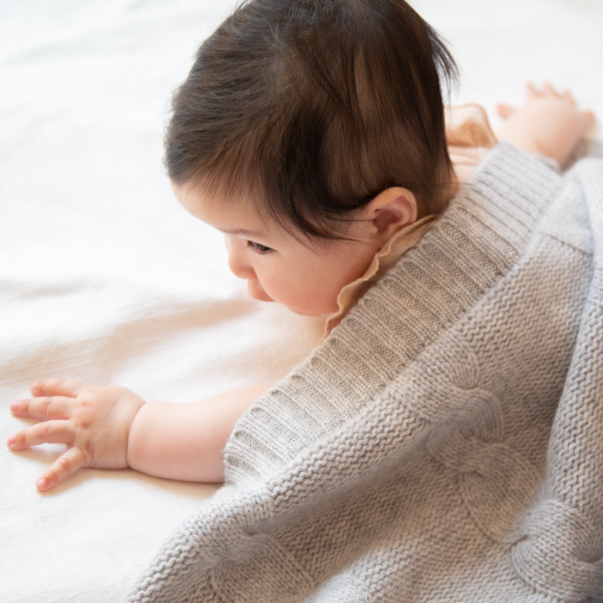 JULES cashmere baby blanket with cable-knit pattern
